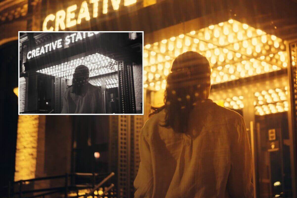 Convert a black-and-white movie clip into a color and high-definition video showing a woman's back